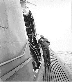 Next to the damaged sail